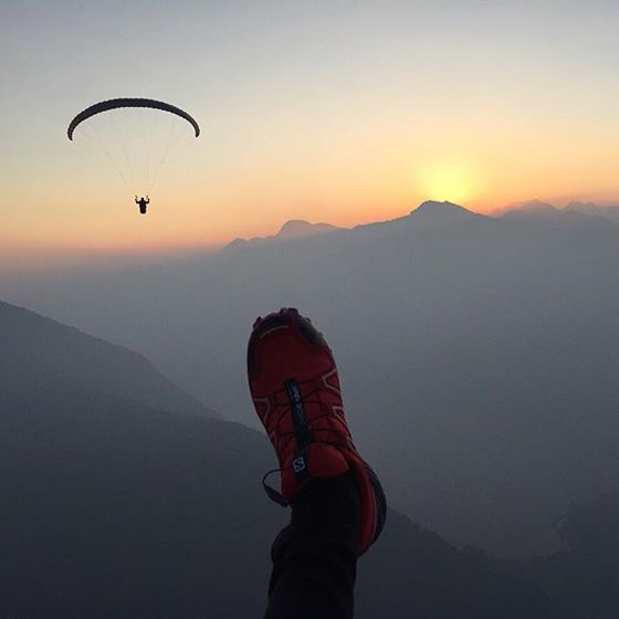 A picture from kathrin's point of view while paragliding